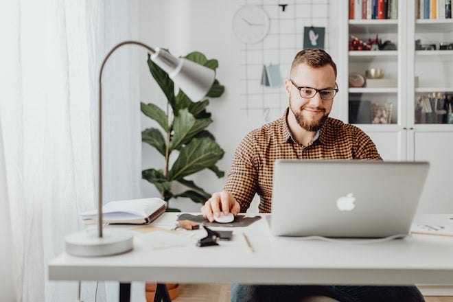 man working at laptop