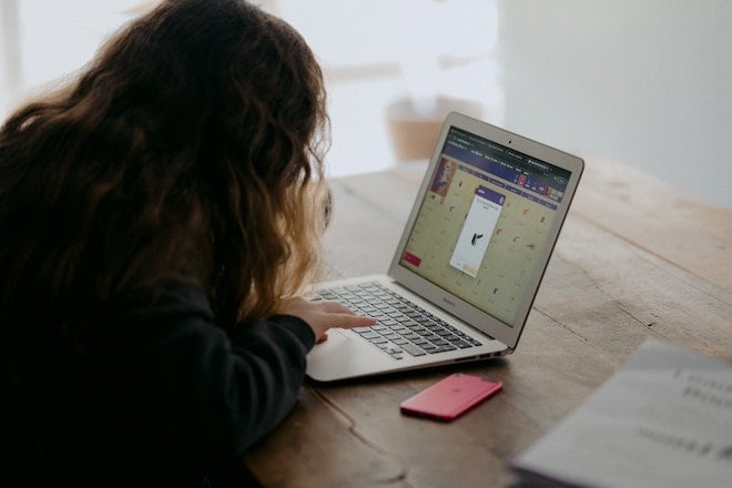 teenager working at computer